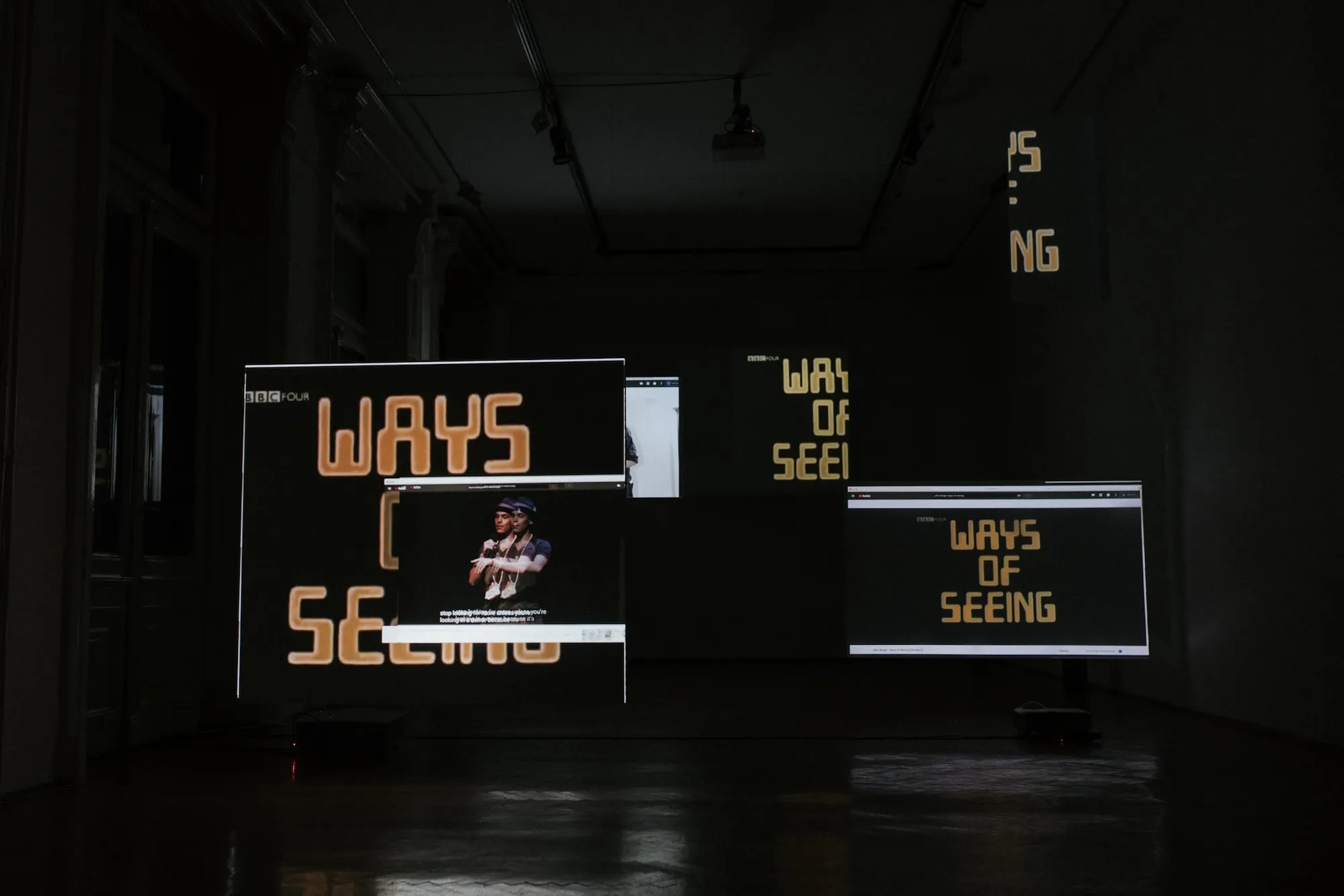 Installation view: multiple screens displaying the title 'Ways of Seeing' in a BBC Four title card style.